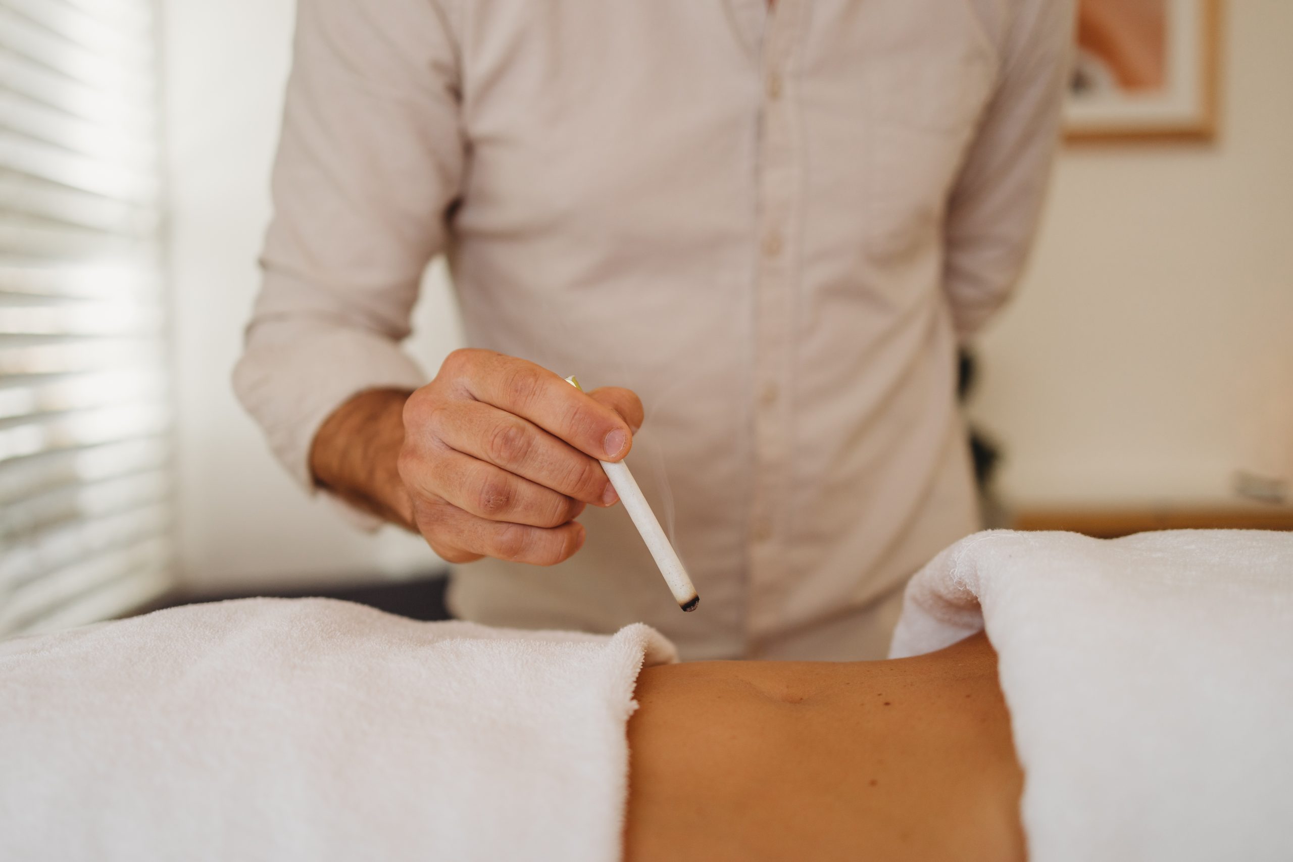 Dr. Truth Robinson performing acupuncture treatment at Ascend Acupuncture Byron Bay