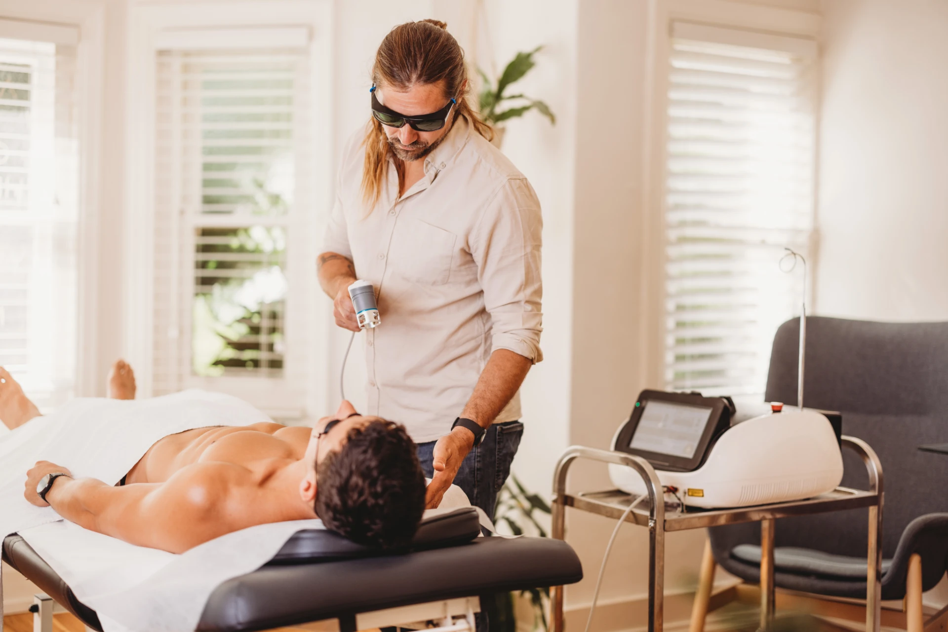 Laser therapy patient treatment at Ascend Acupuncture Byron Bay Lennox Head